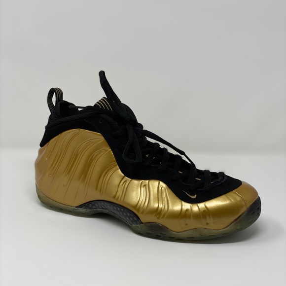 nike air foamposite one metallic gold